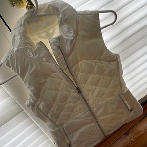 LuLu lemon vest size 4. Has barely seen the light of day . No flaws